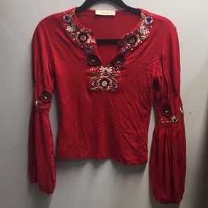 Red floral blouse